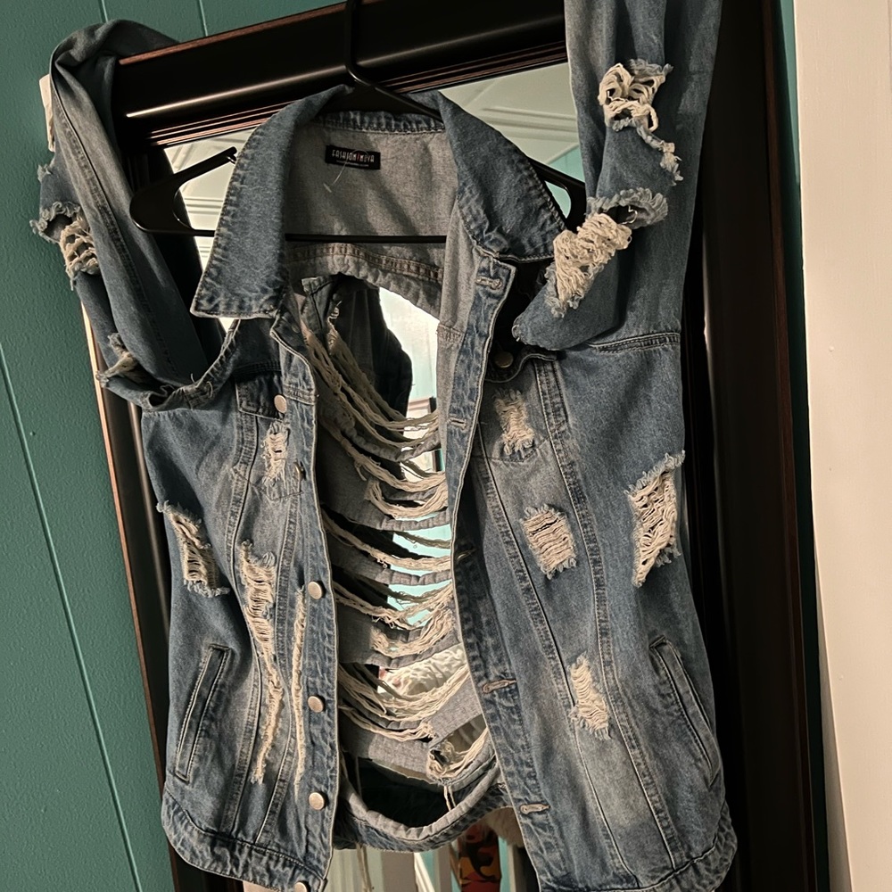 Jean jacket. Brand new condition. Hardly wore.